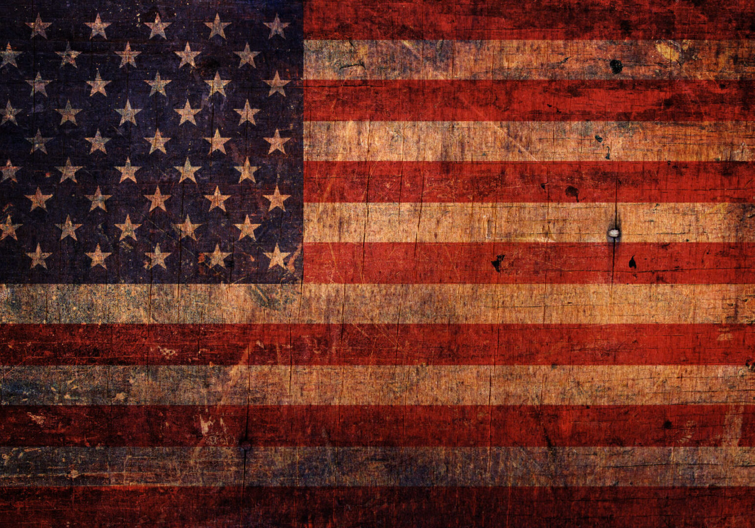 An old and vintage grunge American flag background.